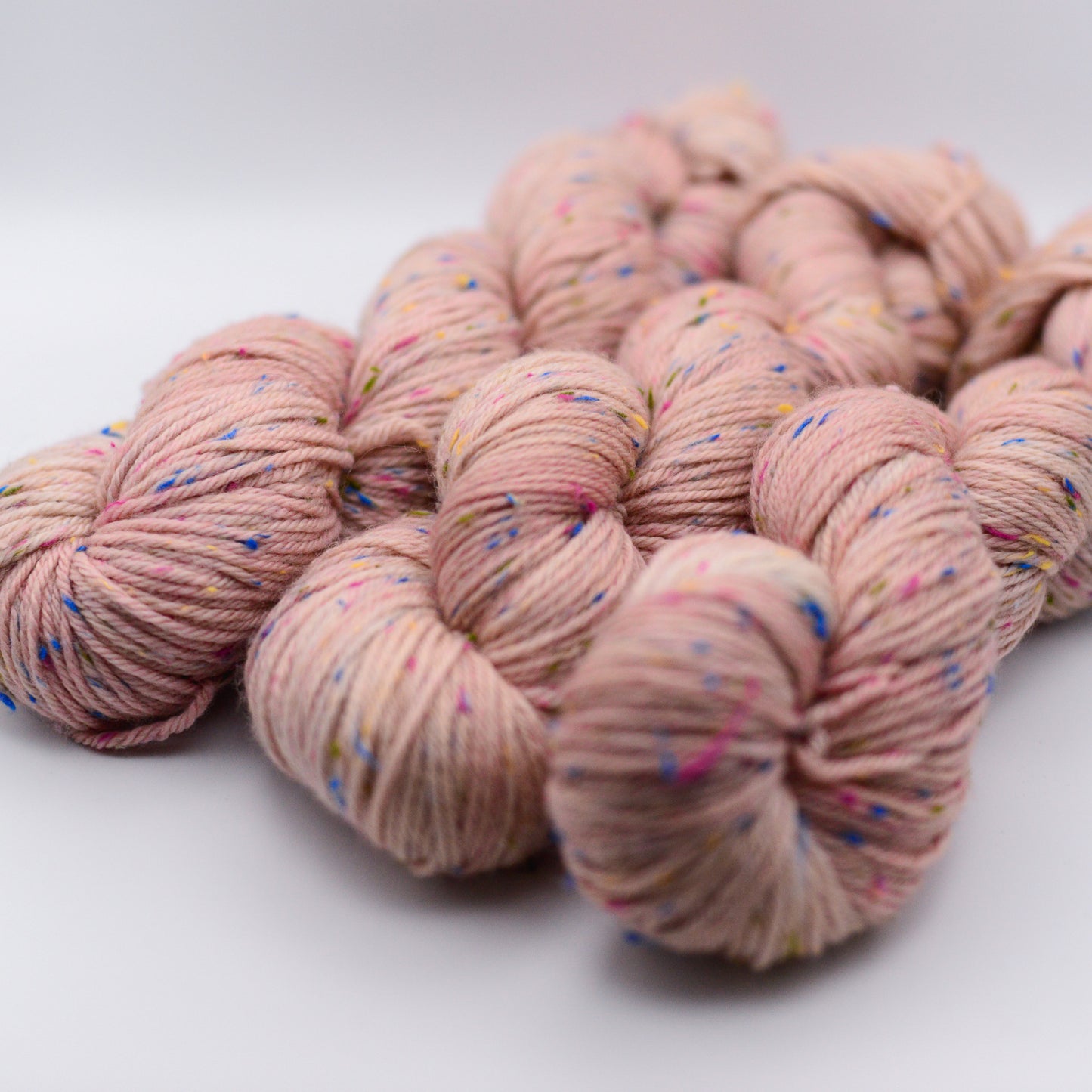 BKD Popsicle DK, hand dyed confetti yarn with re-cycled yarn rests